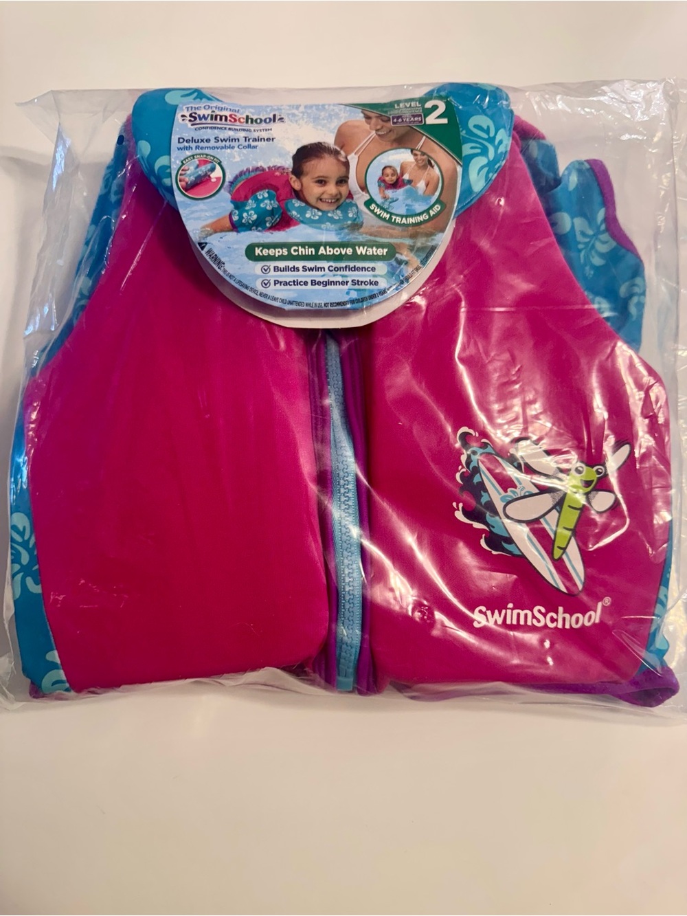 New in Package SwimSchool Pink & Blue Kids Swim Trainer Vest, Size 4-6 years.